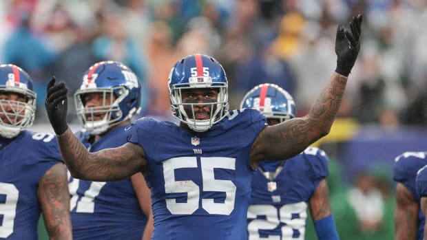 Oct 29, 2023; East Rutherford, New Jersey, USA; New York Giants linebacker Jihad Ward (55) gestures to fans during the second half against the New York Jets at MetLife Stadium.